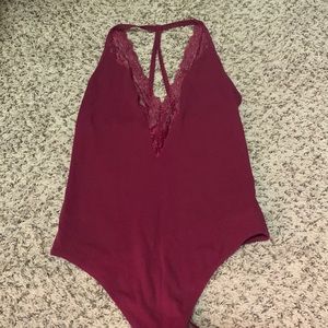 Maroon body suit. Size S
